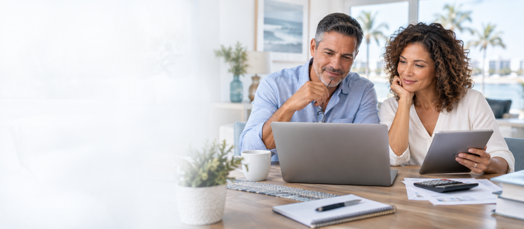 Couple using insurance resources and educational tools